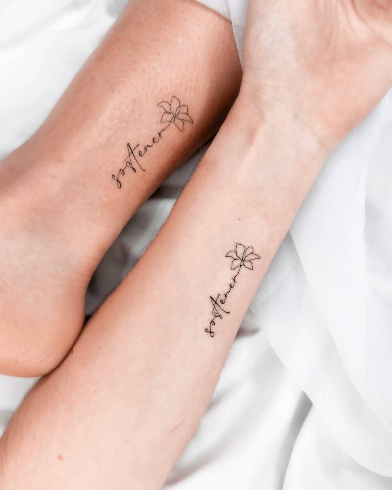 "Sostener" and flower matching tattoo for best friends.