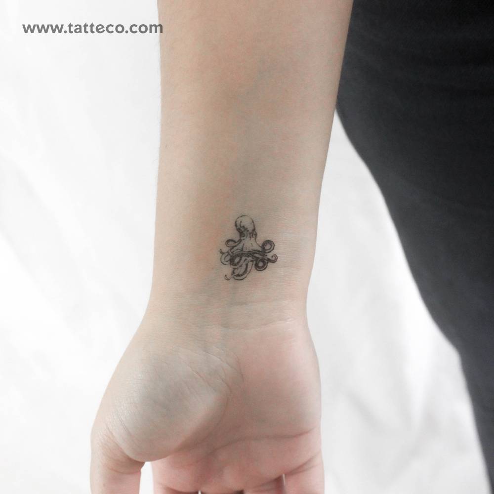 Small octopus temporary tattoo located on the wrist.