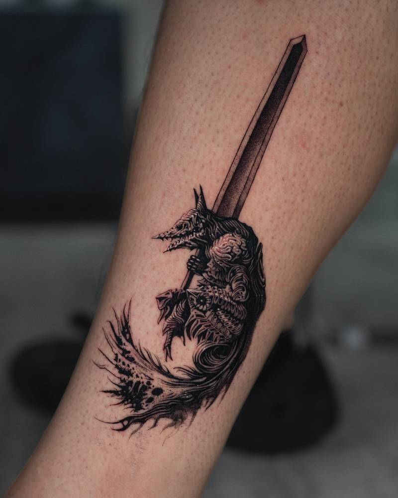 The Berserker Armor tattoo located on the shin, illustrative style.