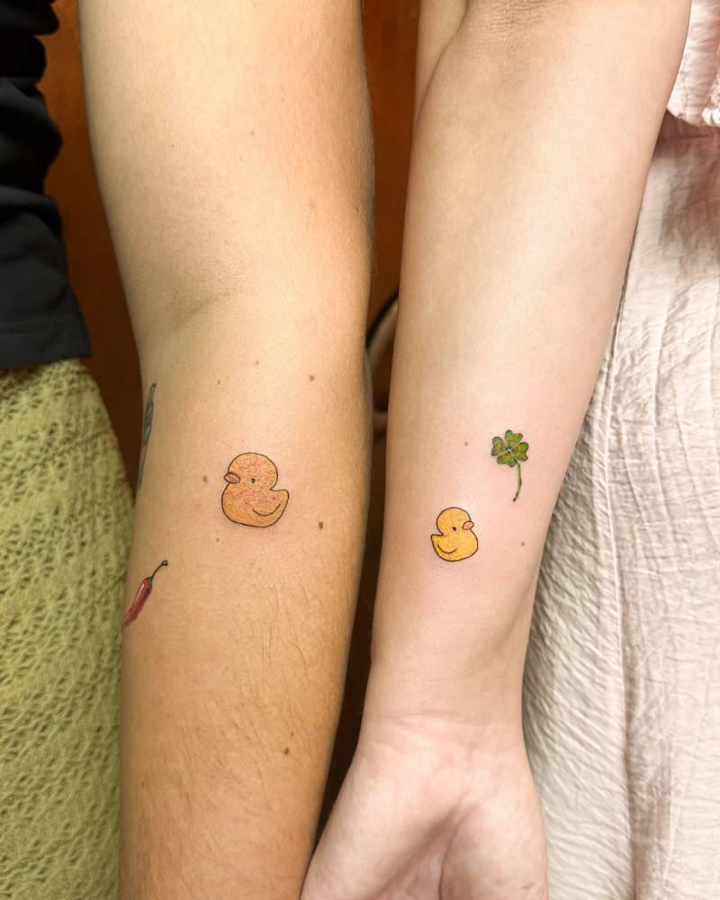 Matching little rubber duck tattoo for best friends.