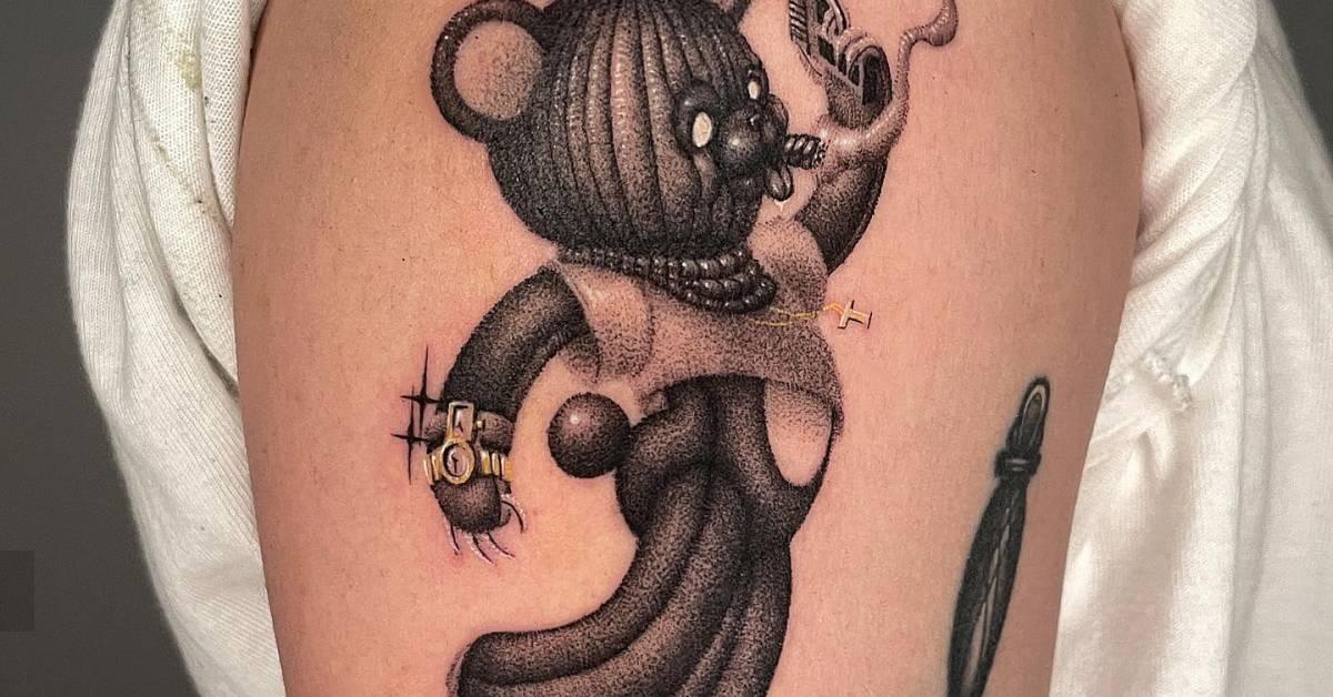 Dotwork style thug teddy bear tattoo located on the