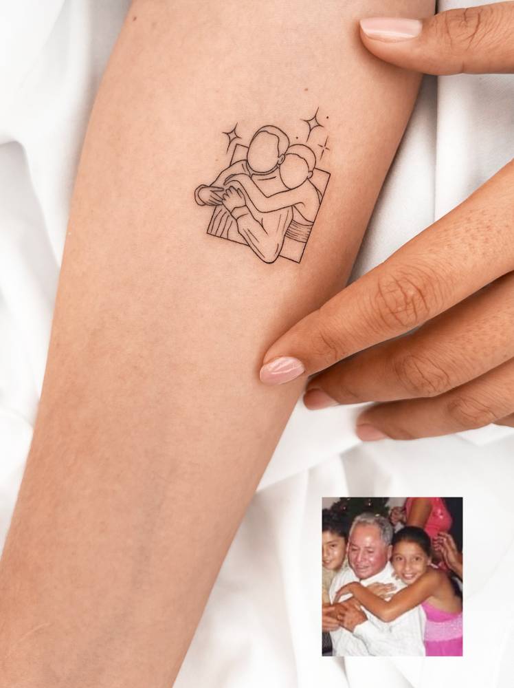 Her and her grandpa's portrait tattooed on the inner forearm.