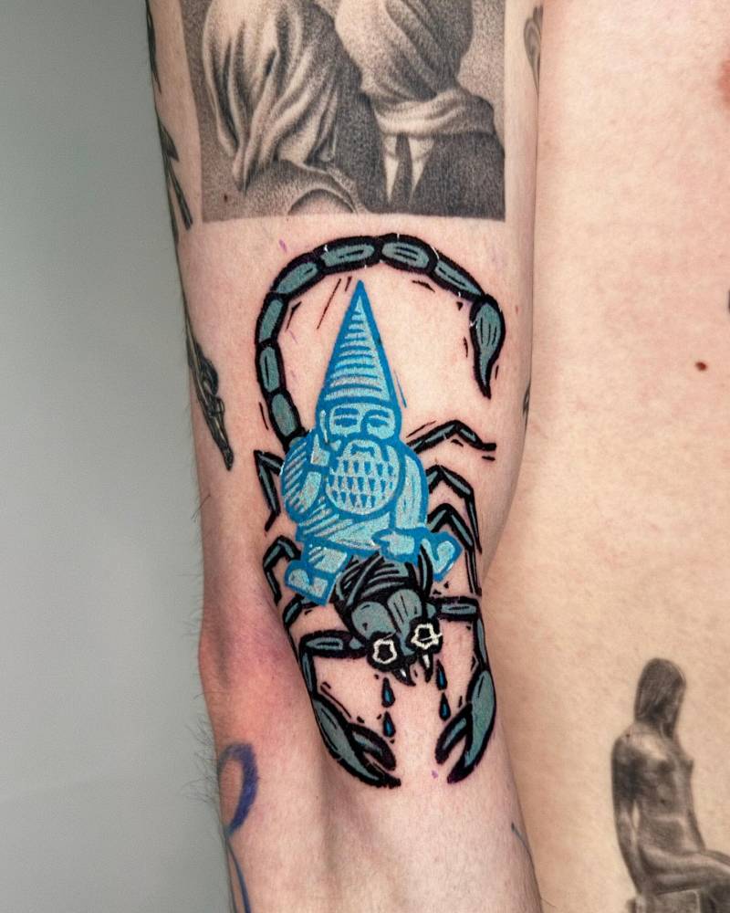 Gnome and scorpion tattoo located on the arm, cartoon style.