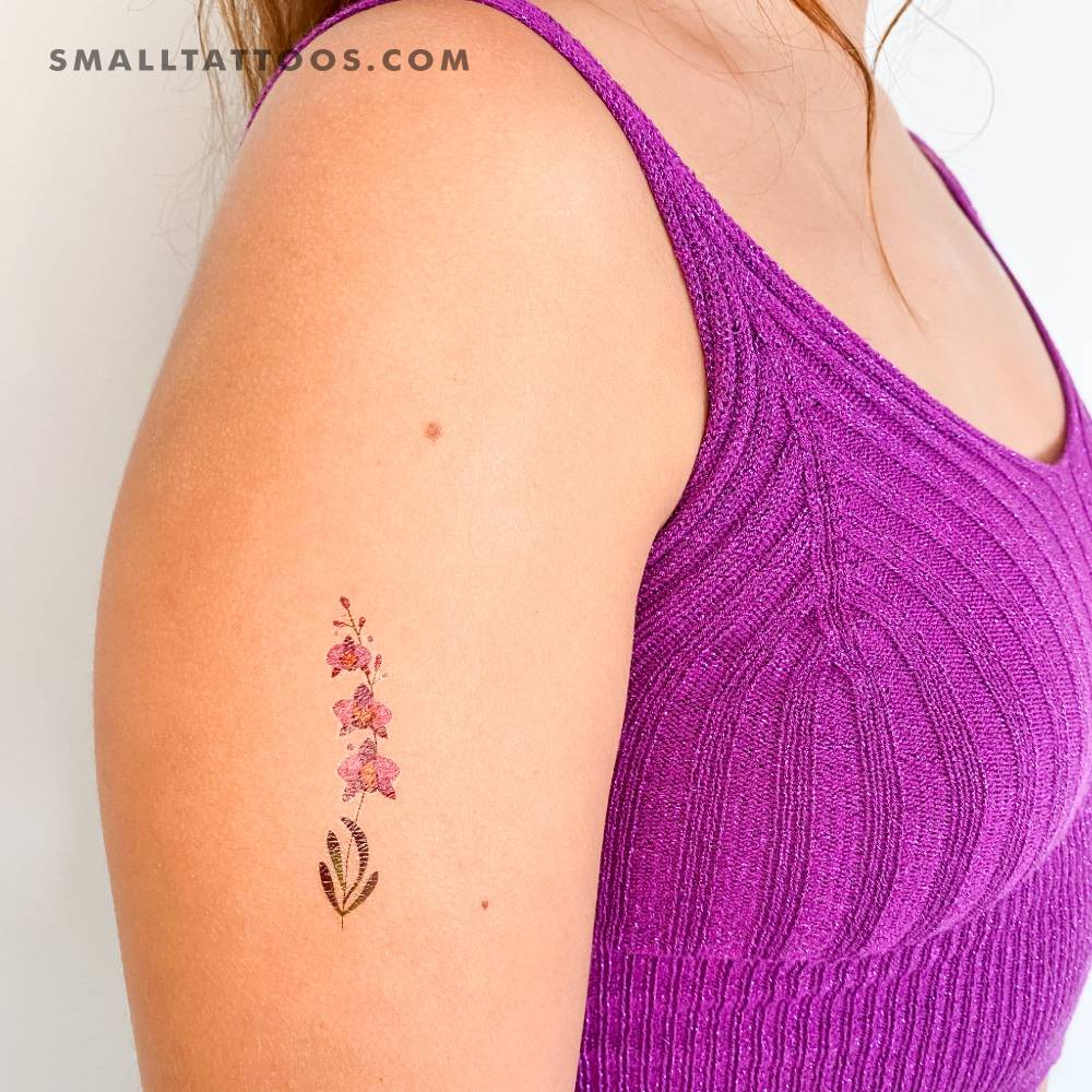 Purple orchid temporary tattoo by Lena Fedchenko.