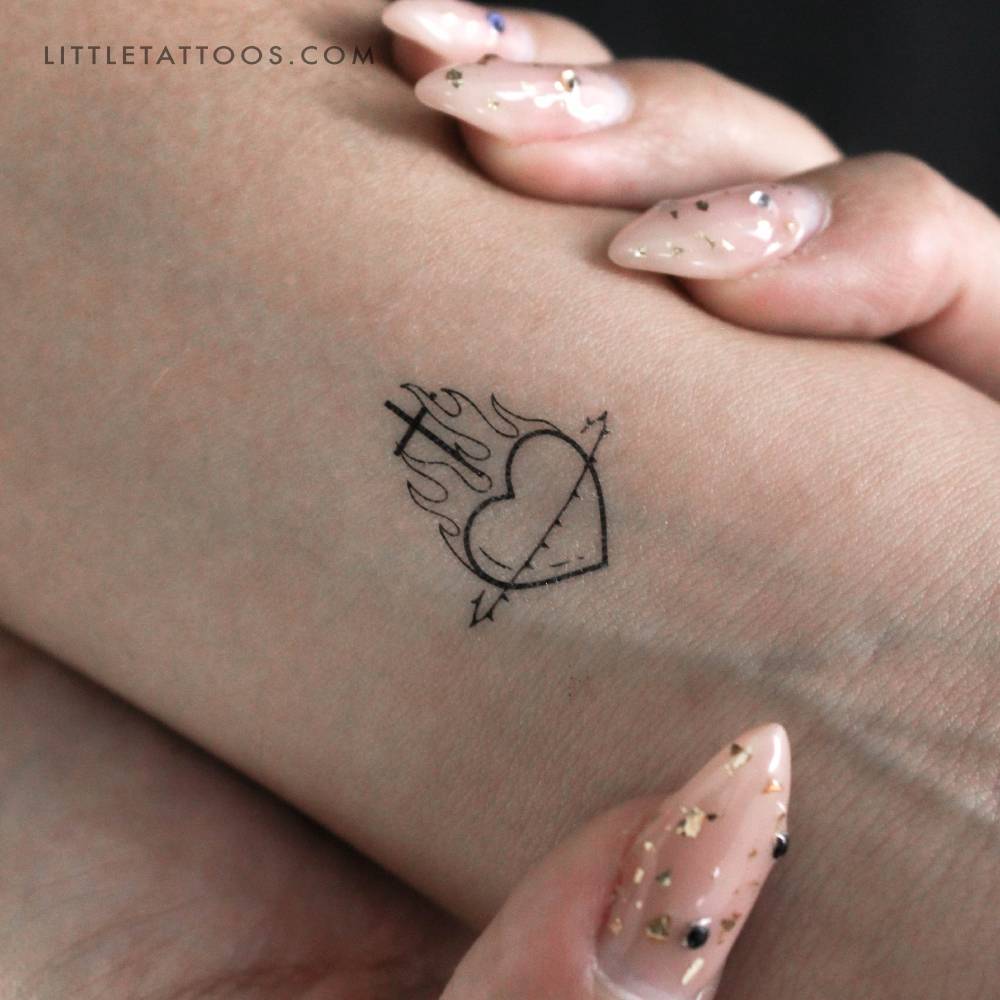 Sacred heart temporary tattoo located on the wrist.
