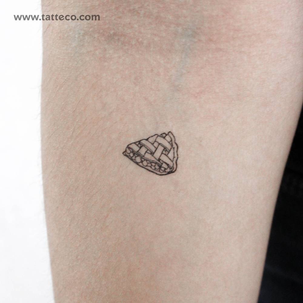 Apple pie temporary tattoo located on the inner forearm.