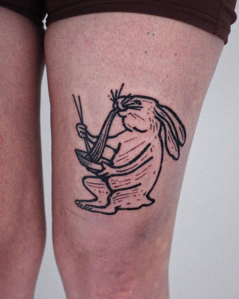 Rabbit tattoo in engraving style done on the thigh.