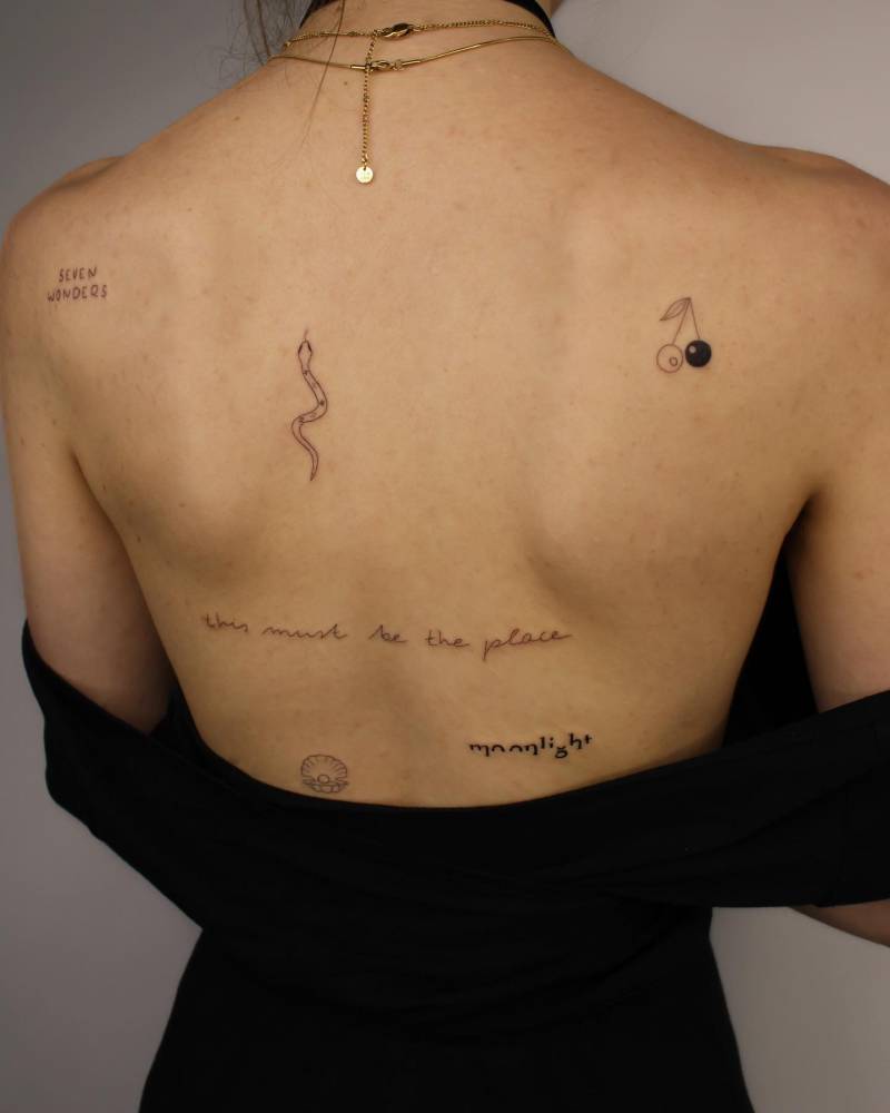 Back composition tattoos.