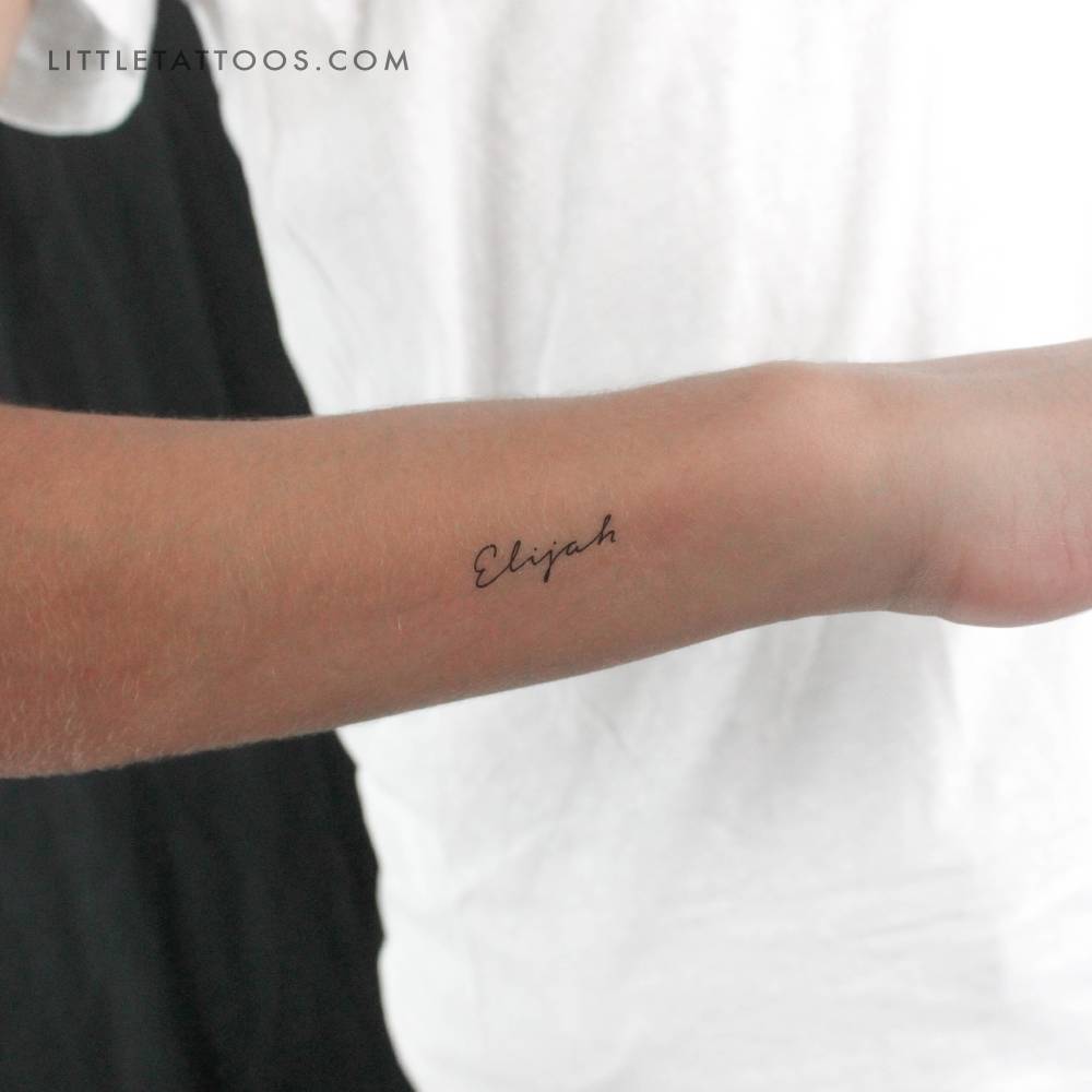 Handwritten font name "Elijah" temporary tattoo located on the wrist.