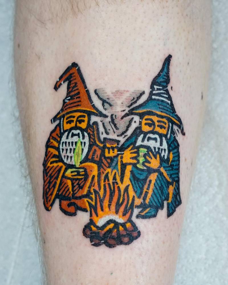 Wizard gnomes tattoo located on the shin, pop art style.