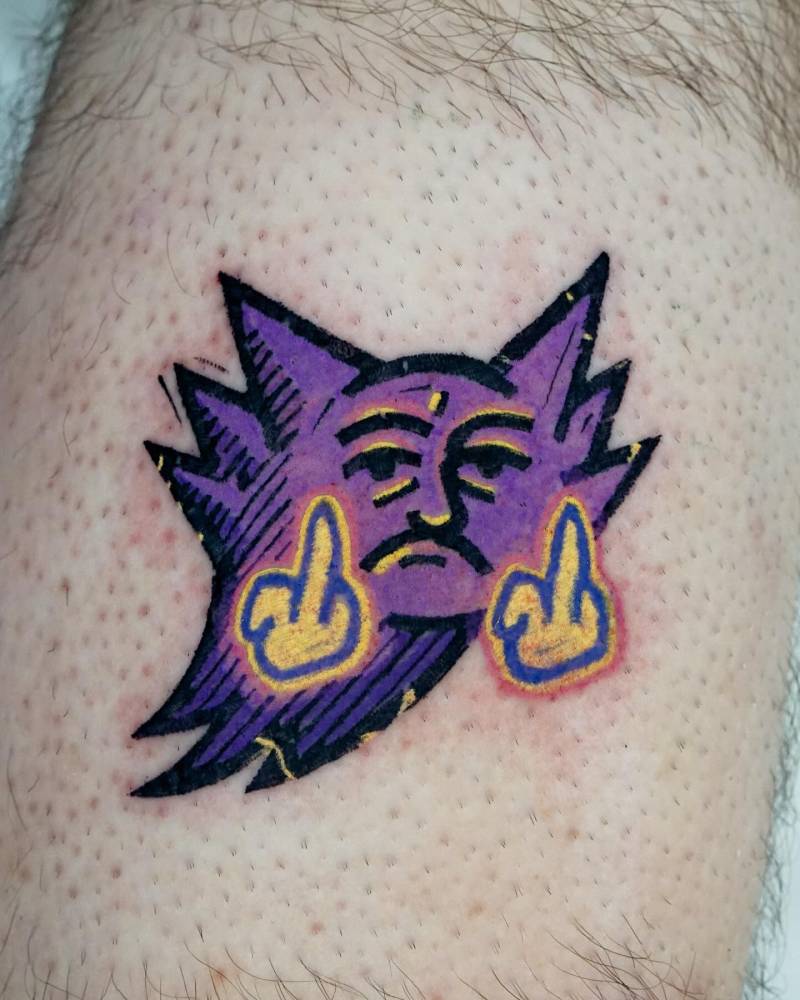 Haunter tattoo located on the shin, cartoon style.