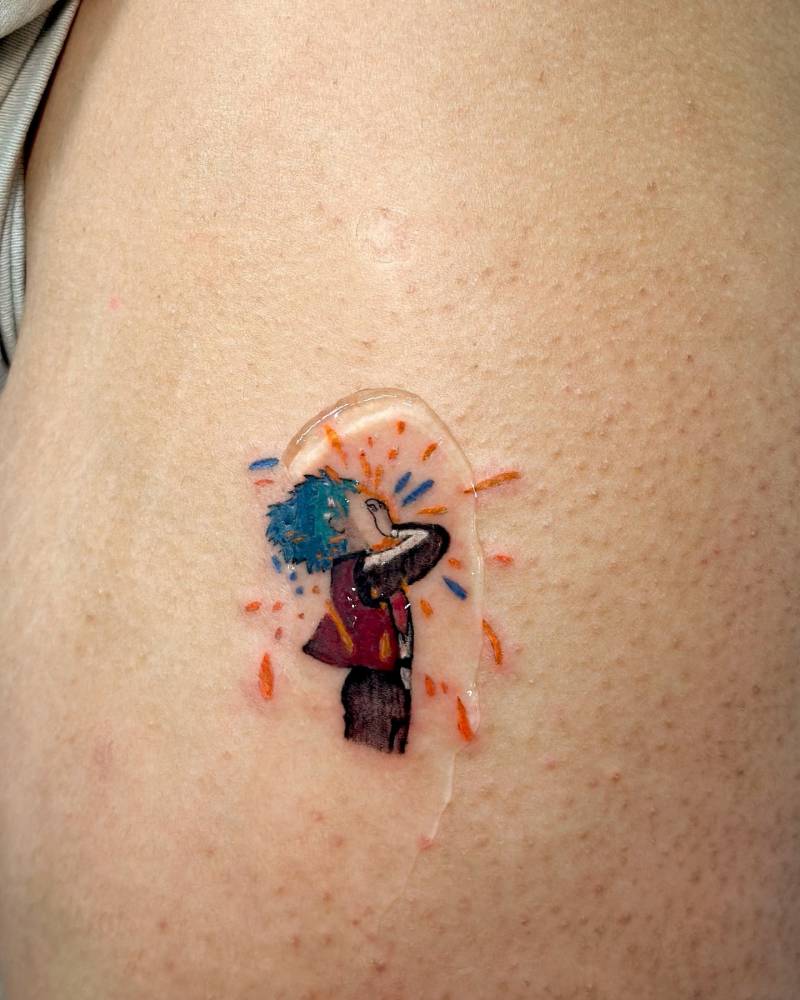 Sophie Hatter tattoo in cartoon style placed on the thigh.