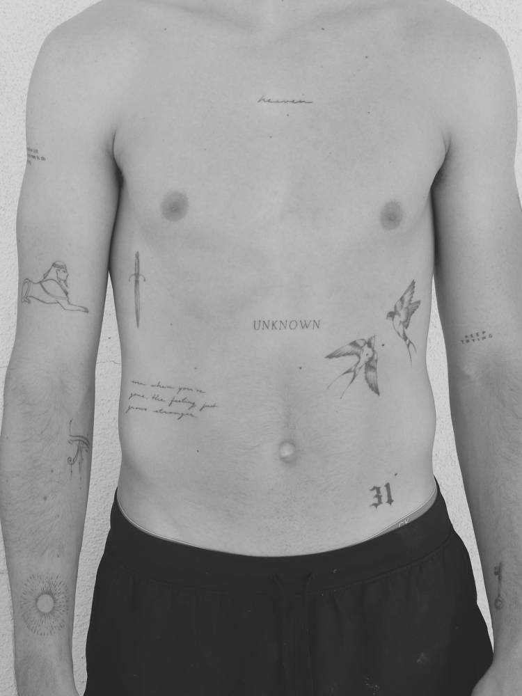 Torso composition tattoos.