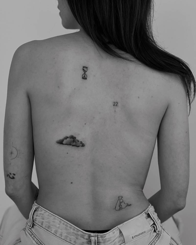 Back composition tattoos in illustrative style.