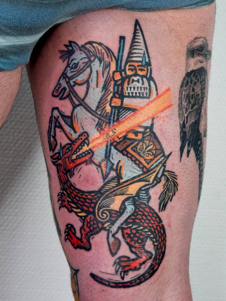 Gnome knight fighting a red dragon tattoo.