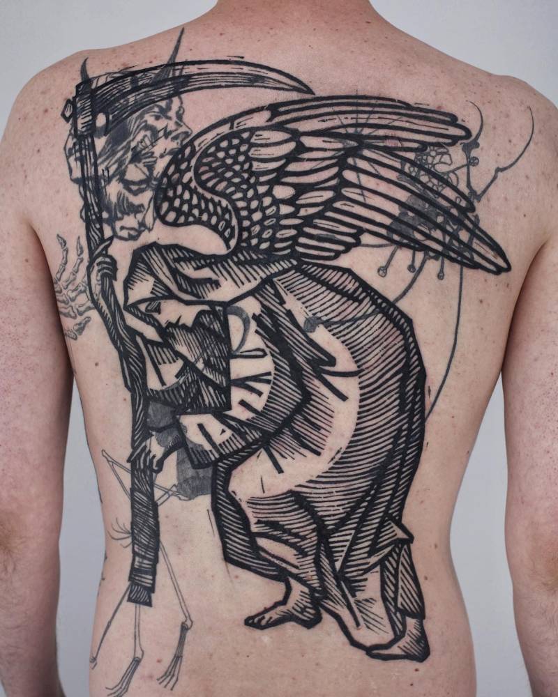 'The Angel of Death' backpiece cover up tattoo in engraving style.