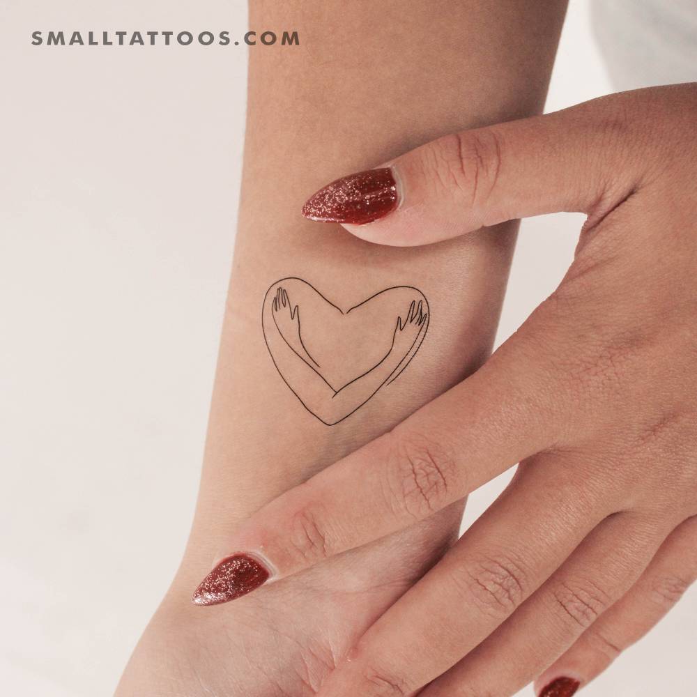 Self-Love temporary tattoo located on the wrist, fine line style.