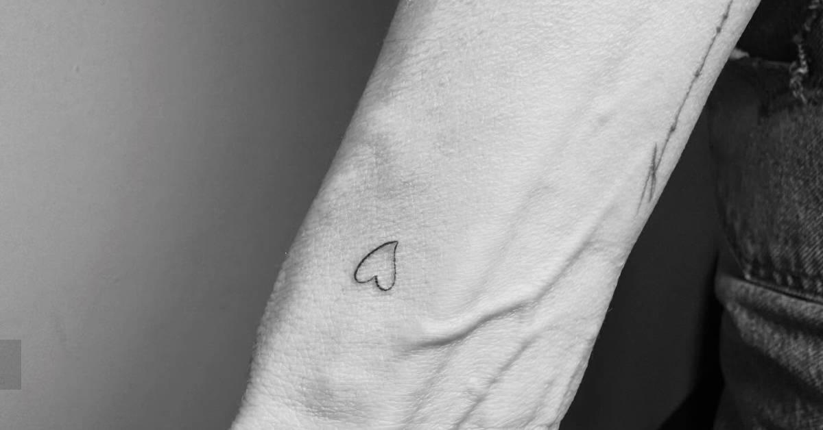 Little heart tattoo placed on the wrist, minimalistic