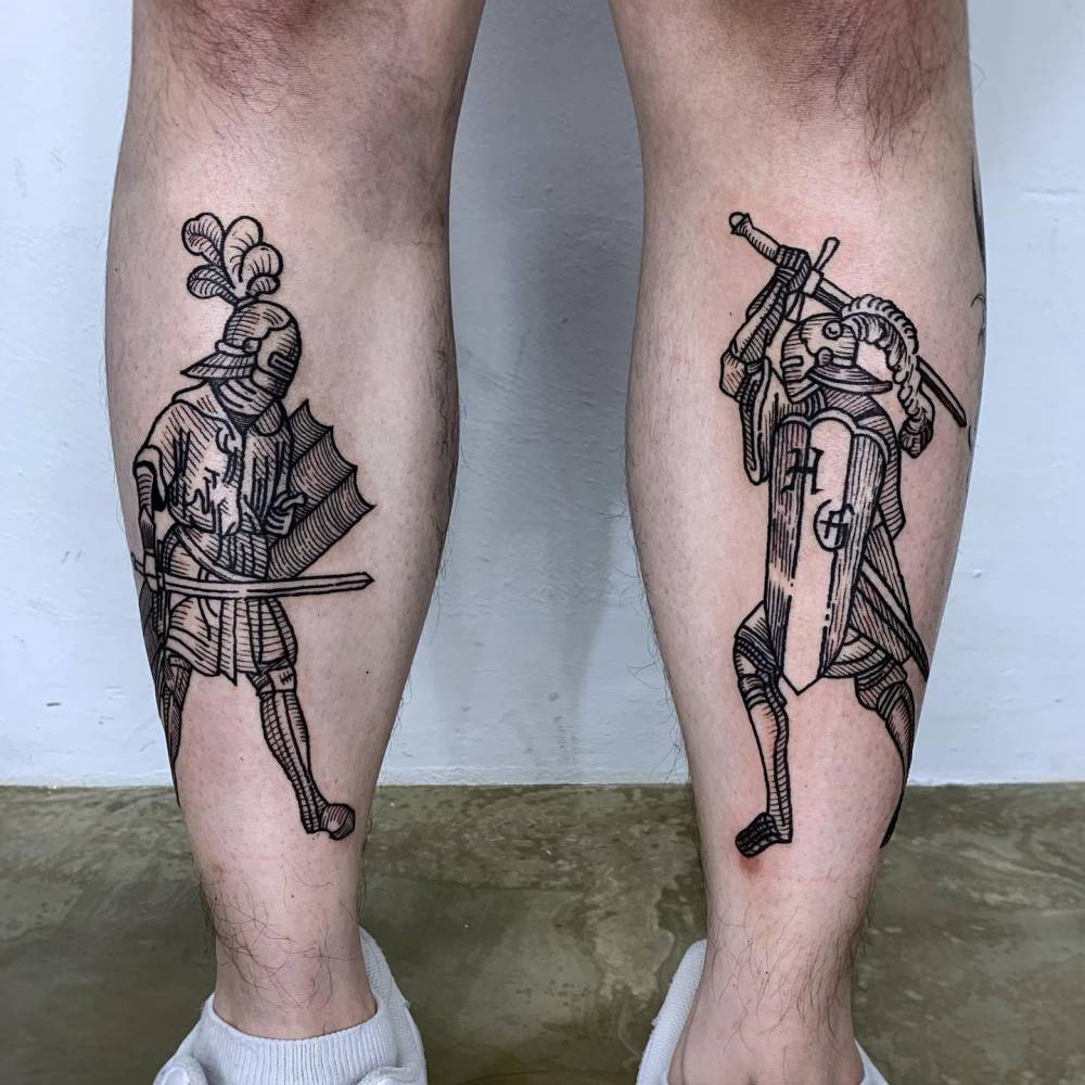Individual matching knights tattoo in engraving style.