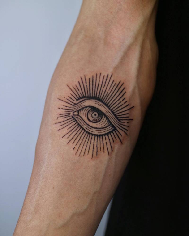 Blackwork style eye tattoo placed on the inner forearm.
