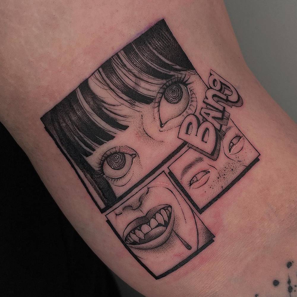 Comic book style tattoo located on the inner arm.