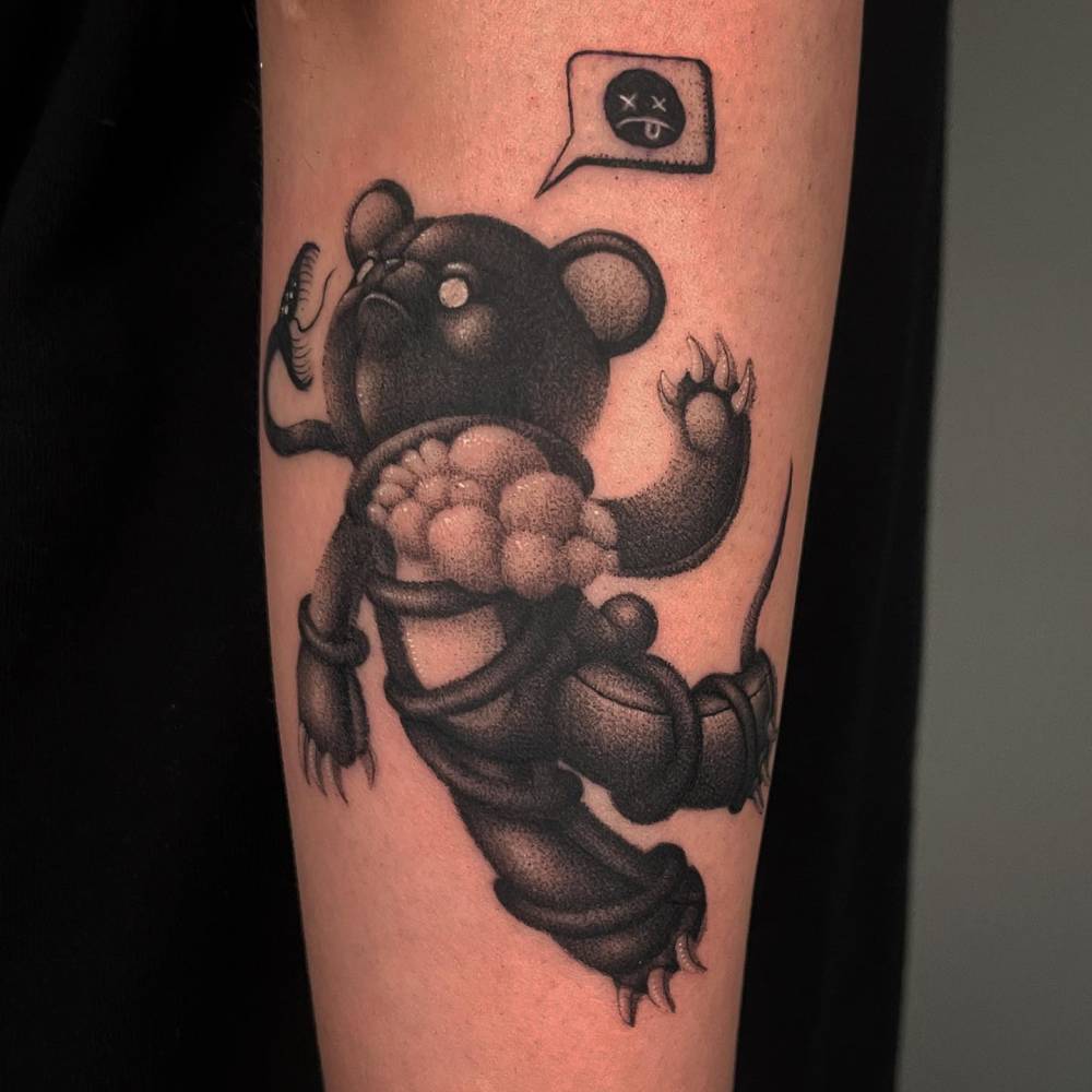 Teddy bear tattoo located on the forearm, done in dotwork style.