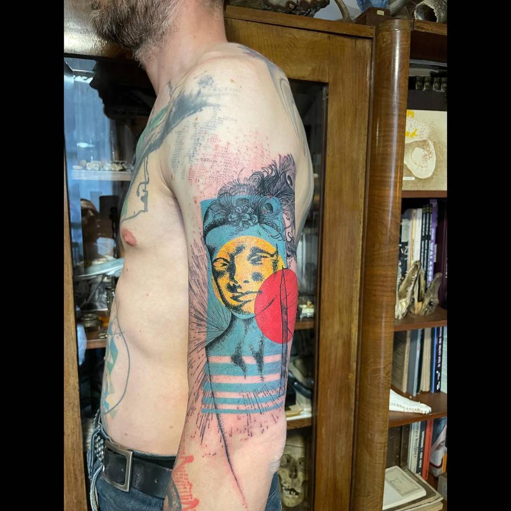 'Salomé' tattoo ion graphic style located on the upper arm.