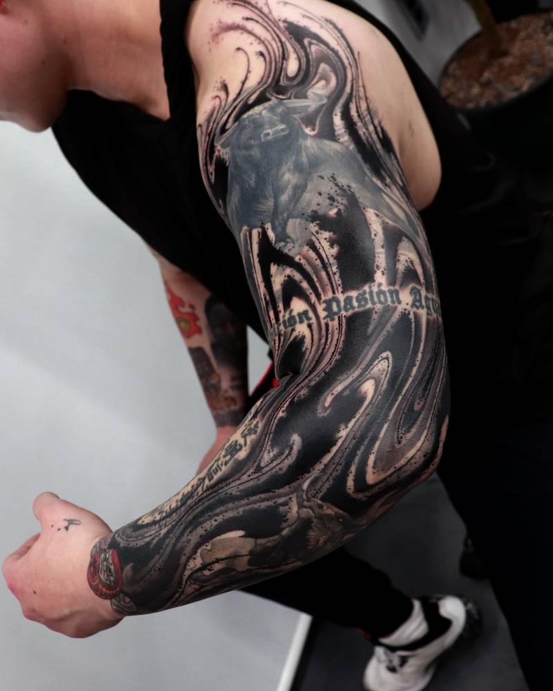 Abstract cover up tattoo sleeve.