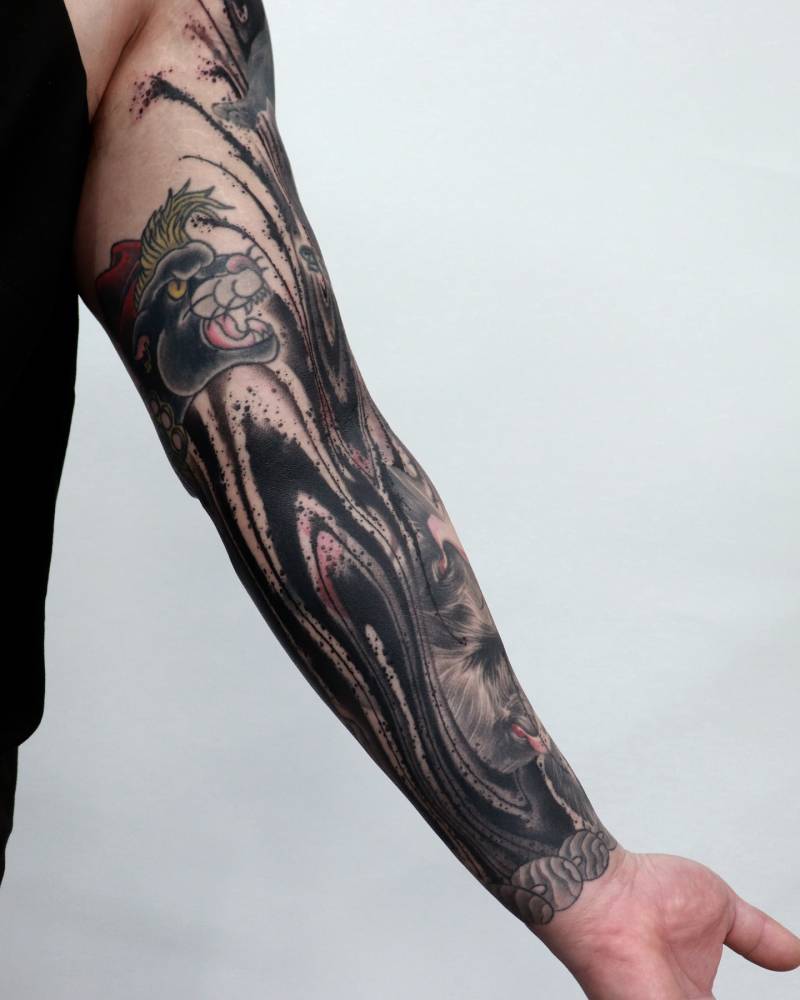 Abstract cover up tattoo sleeve.