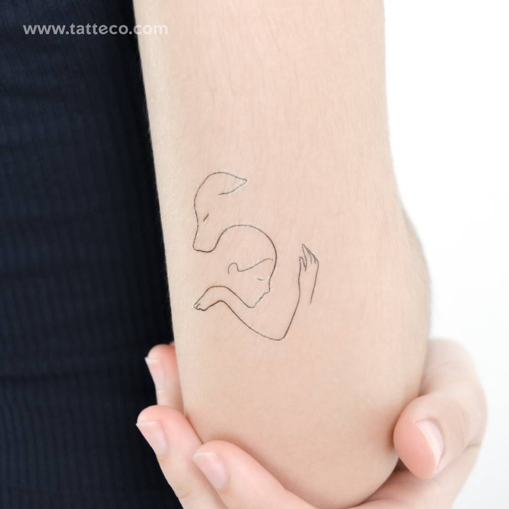 Best friend temporary tattoo located on the tricep.