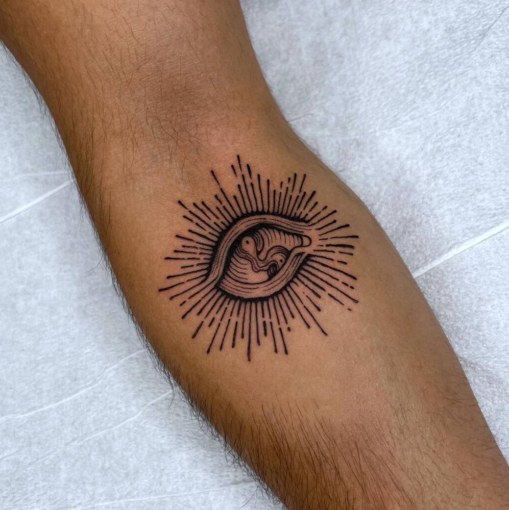 Blackwork style eye tattoo done on the inner forearm.