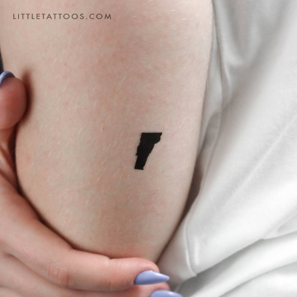 Blackwork style Vermont map temporary tattoo located on the tricep.