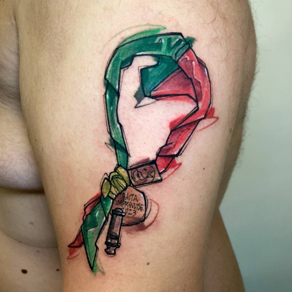 Scouting tattoo in sketch work style located on the upper arm.