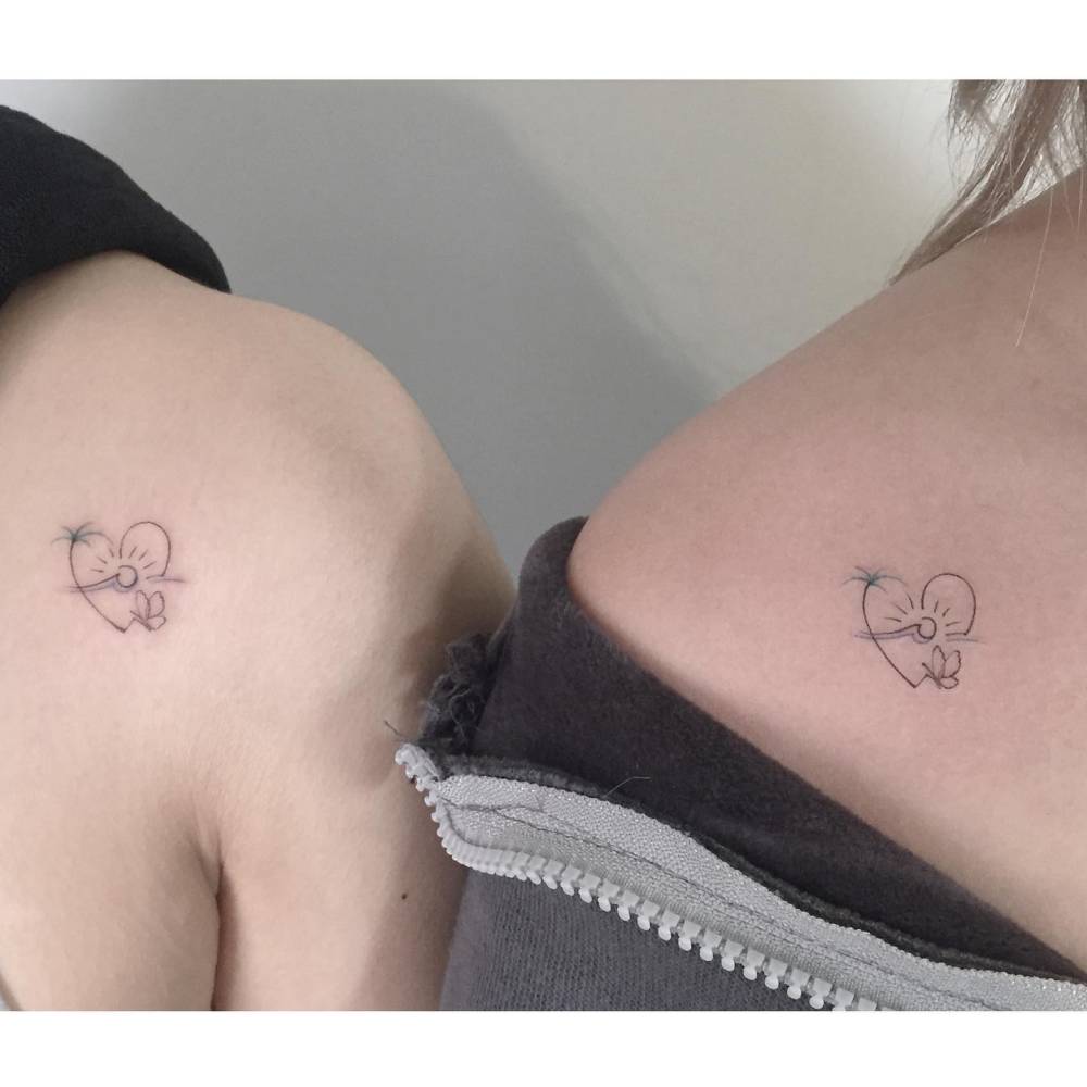 Matching beach heart tattoo for best friends.