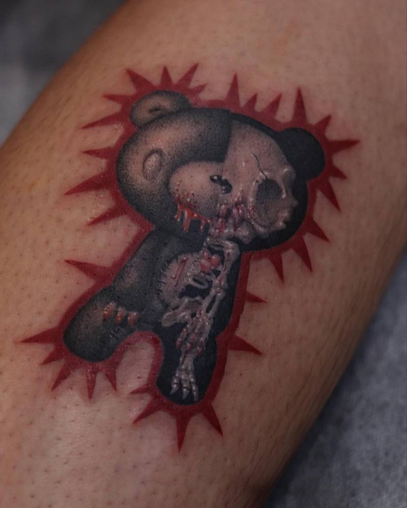 Cute x-ray teddy bear tattoo located on the calf.