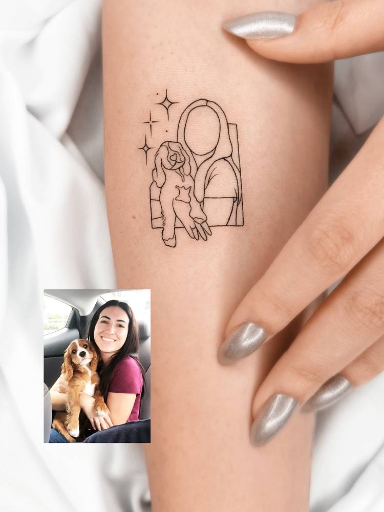 Woman and her dog photograph based tattoo located on the inner forearm.