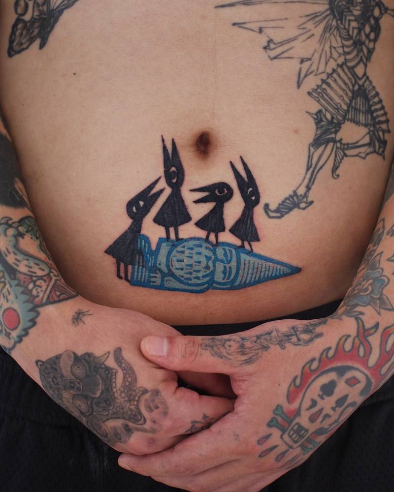 Gnome and crows tattoo in pop art style located on the stomach.