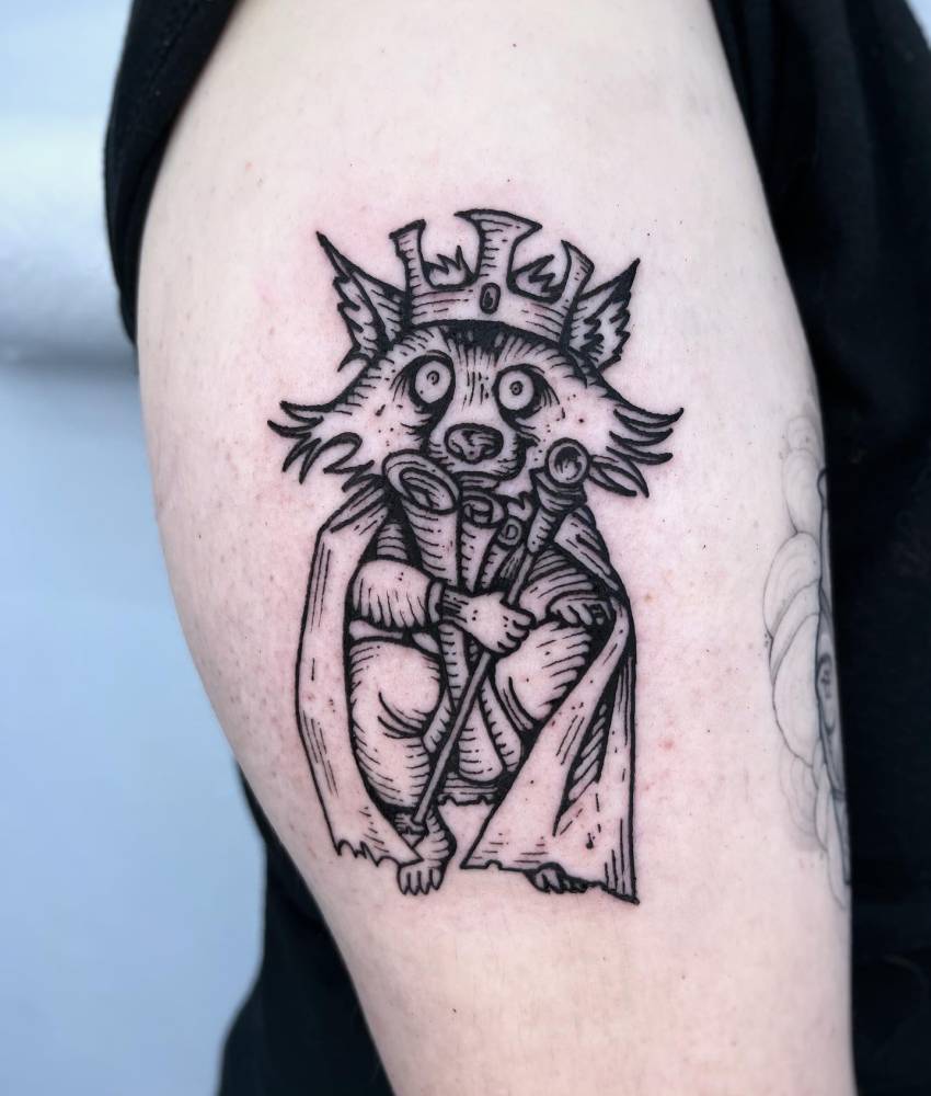 King fox tattoo located on the upper arm, engraving style.