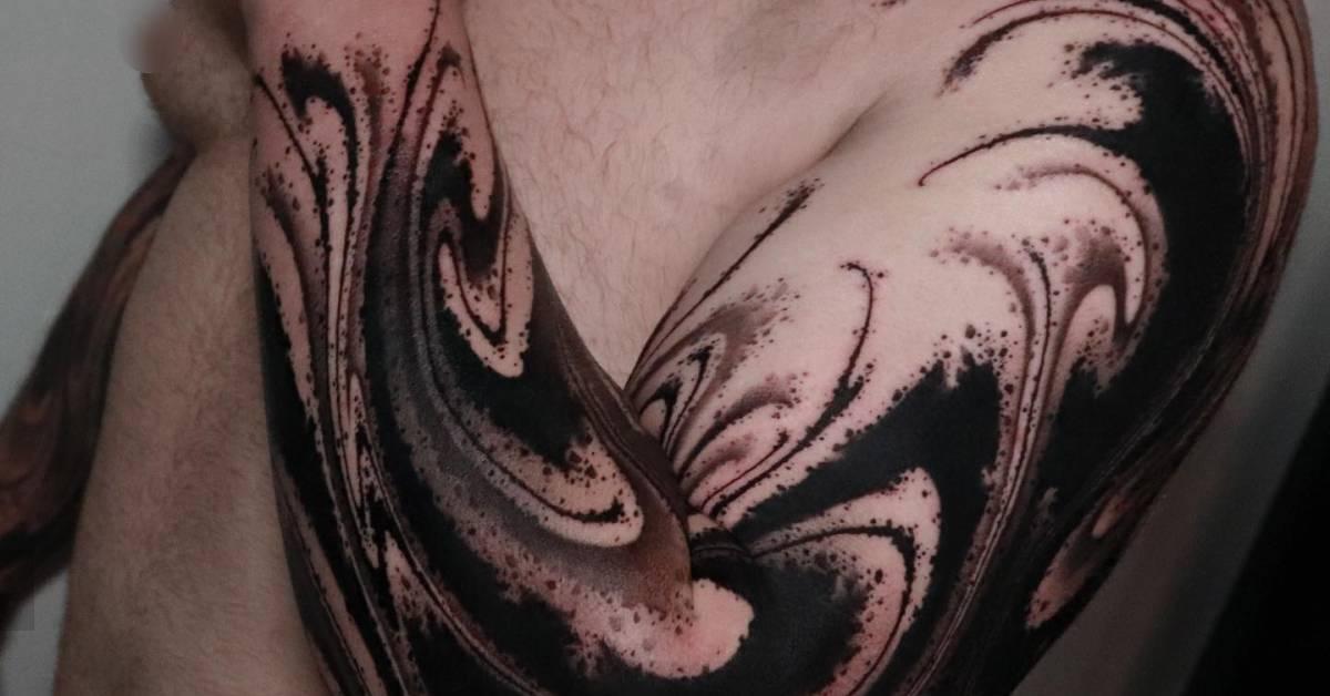 Abstract flow tattoo sleeve in blackwork style.