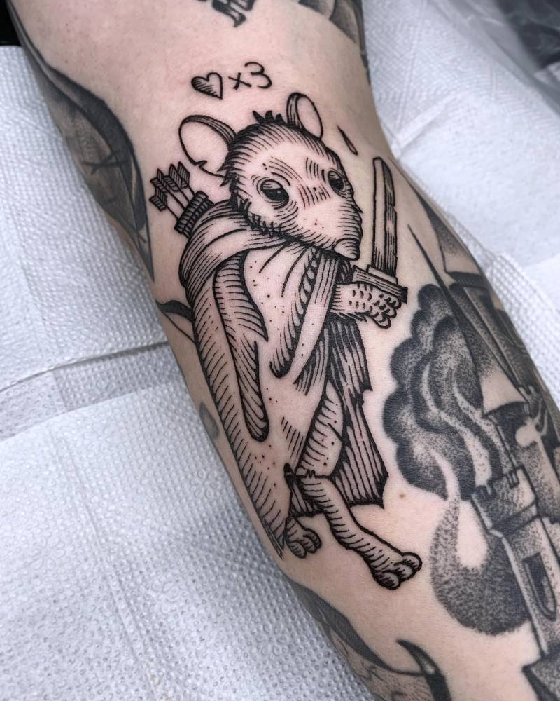 Warrior rat tattoo placed on the forearm in engraving style.