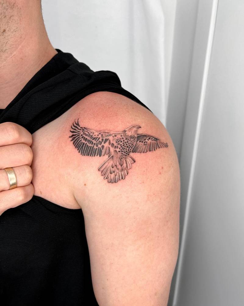 Micro-realistic style eagle tattoo located on the shoulder.