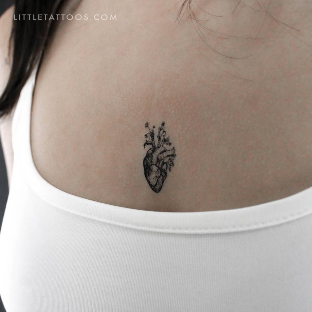 Blackwork style floral anatomical heart temporary tattoo.