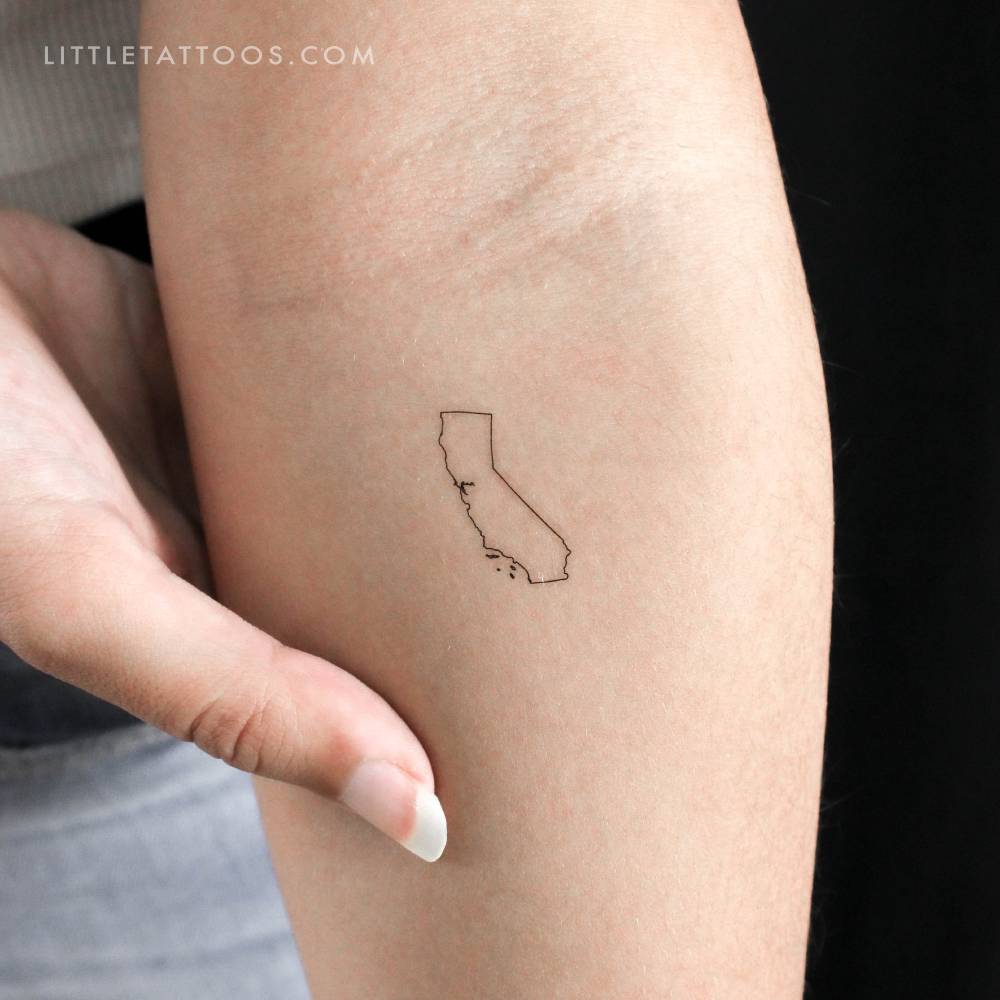 Fine line style California map outline temporary tattoo located on the inner forearm.