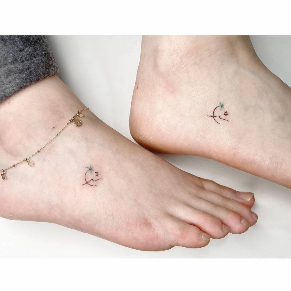 Matching minimalistic beach tattoo for best friends.