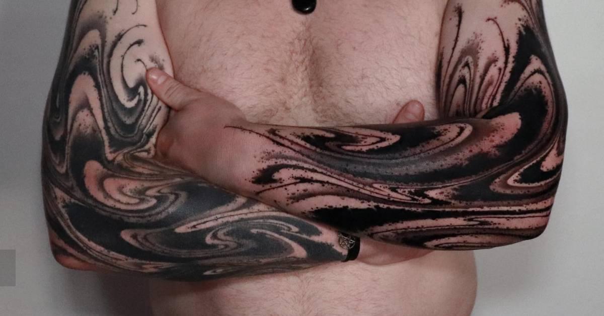 Individual matching abstract tattoo sleeve in blackwork