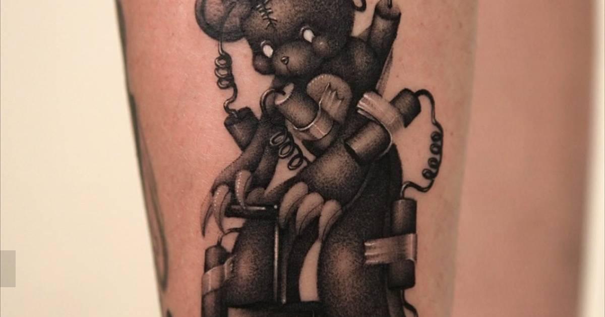 Dynamite teddy bear tattoo located on the shin, dotwork
