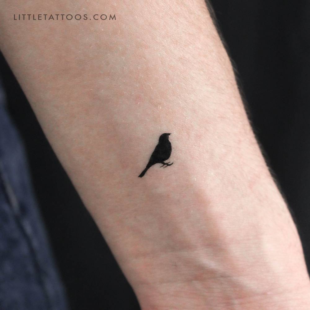 Standing bird temporary tattoo located on the wrist.