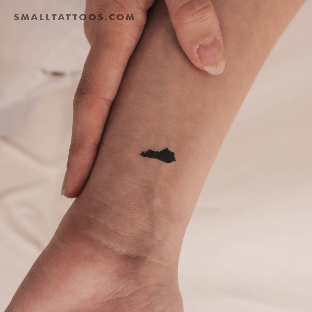 Minimalistic style Kentucky map temporary tattoo located on the wrist.