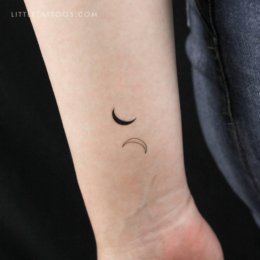Crescent moon couple temporary tattoo located on the wrist.