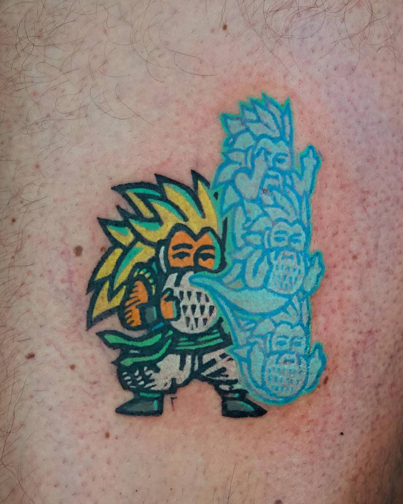 Goku gnome tattoo in pop art style located on the thigh.